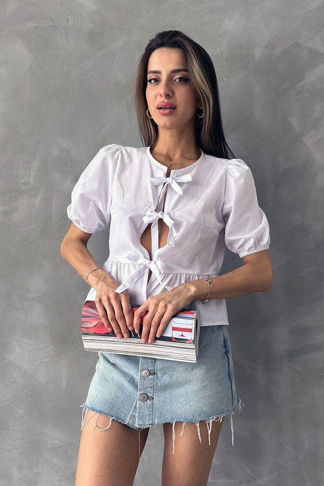 Triple Bow Peplum Top